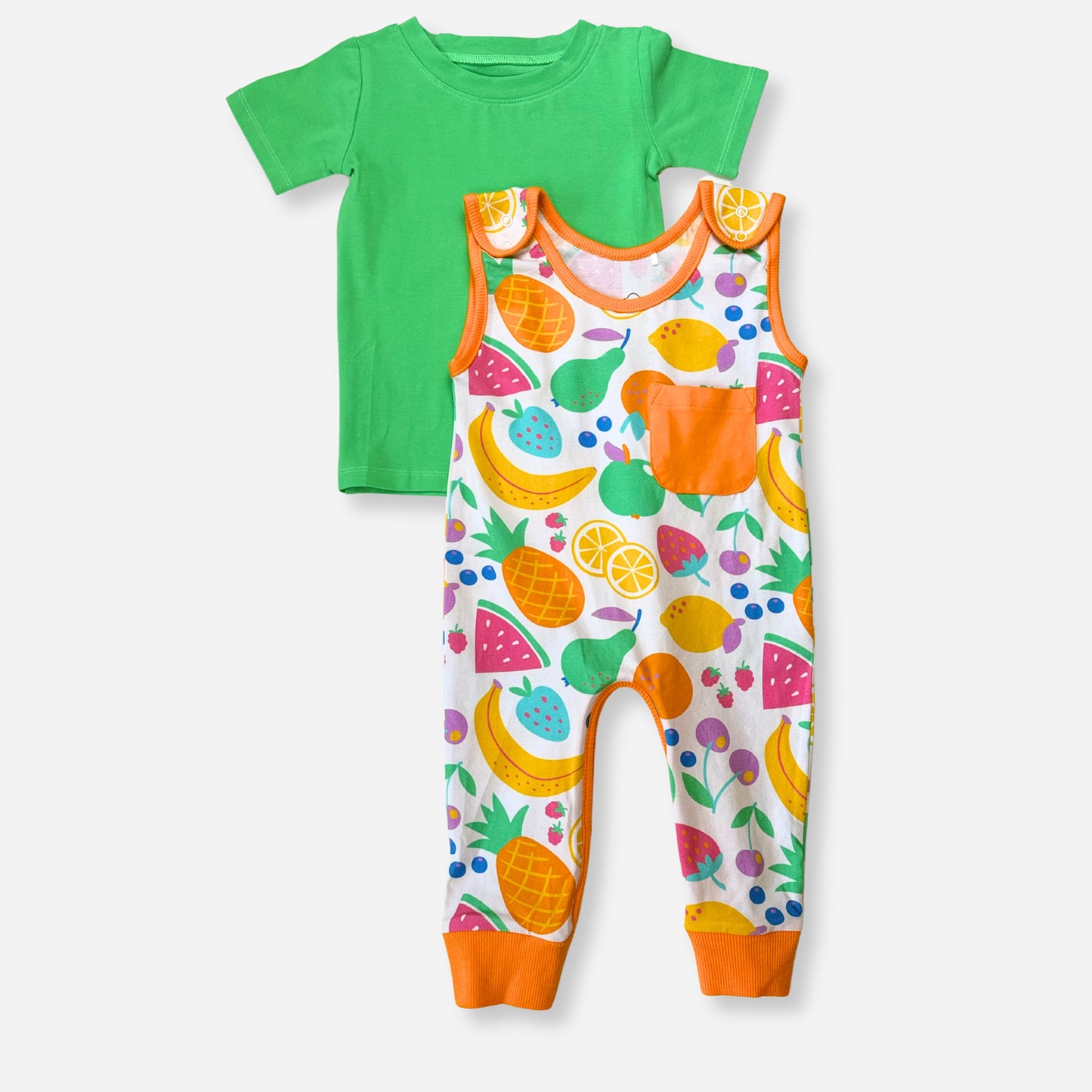 Bright green toddler t-shirt paired with colorful fruit-patterned romper featuring orange accents.