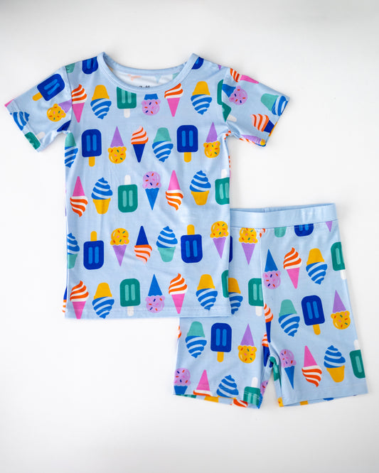 Kids' short-sleeve ice cream print pajamas set, blue cotton, playful and colorful design.