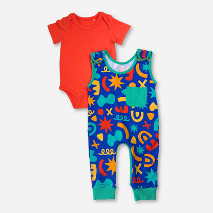 Colorful baby outfit set with a red bodysuit and blue patterned romper made from soft cotton.