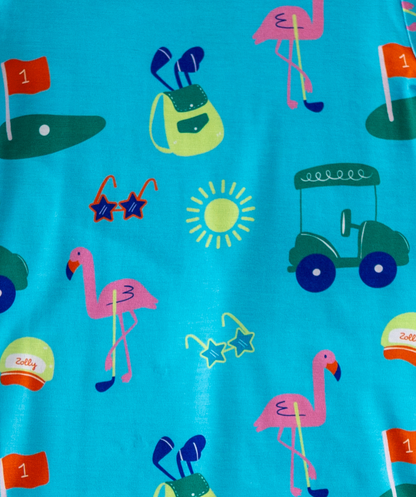 Colorful beach-themed fabric featuring pink flamingos, golf items, and sun, perfect for summer apparel.