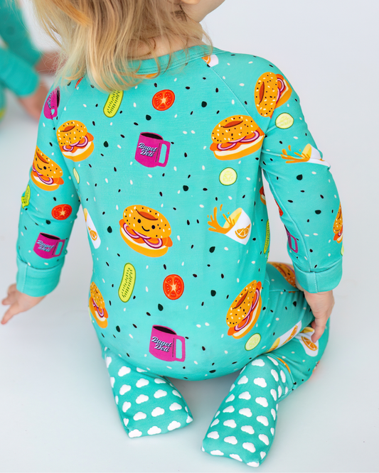 Toddler pajama set in aqua with fun burger and food print, soft cotton material, ideal for comfy sleepwear.