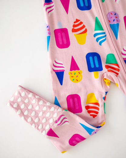 Colorful ice cream themed pink toddler onesie with playful patterns and cozy fabric.