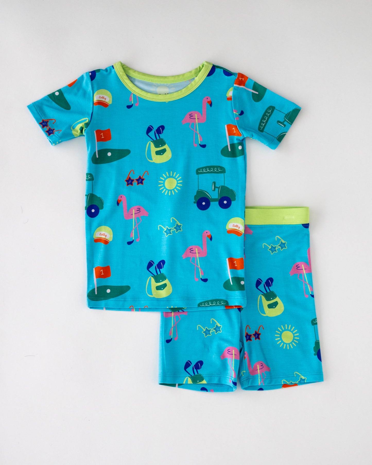 Kids' blue pajama set featuring playful flamingo and summer-themed patterns, made from soft cotton.
