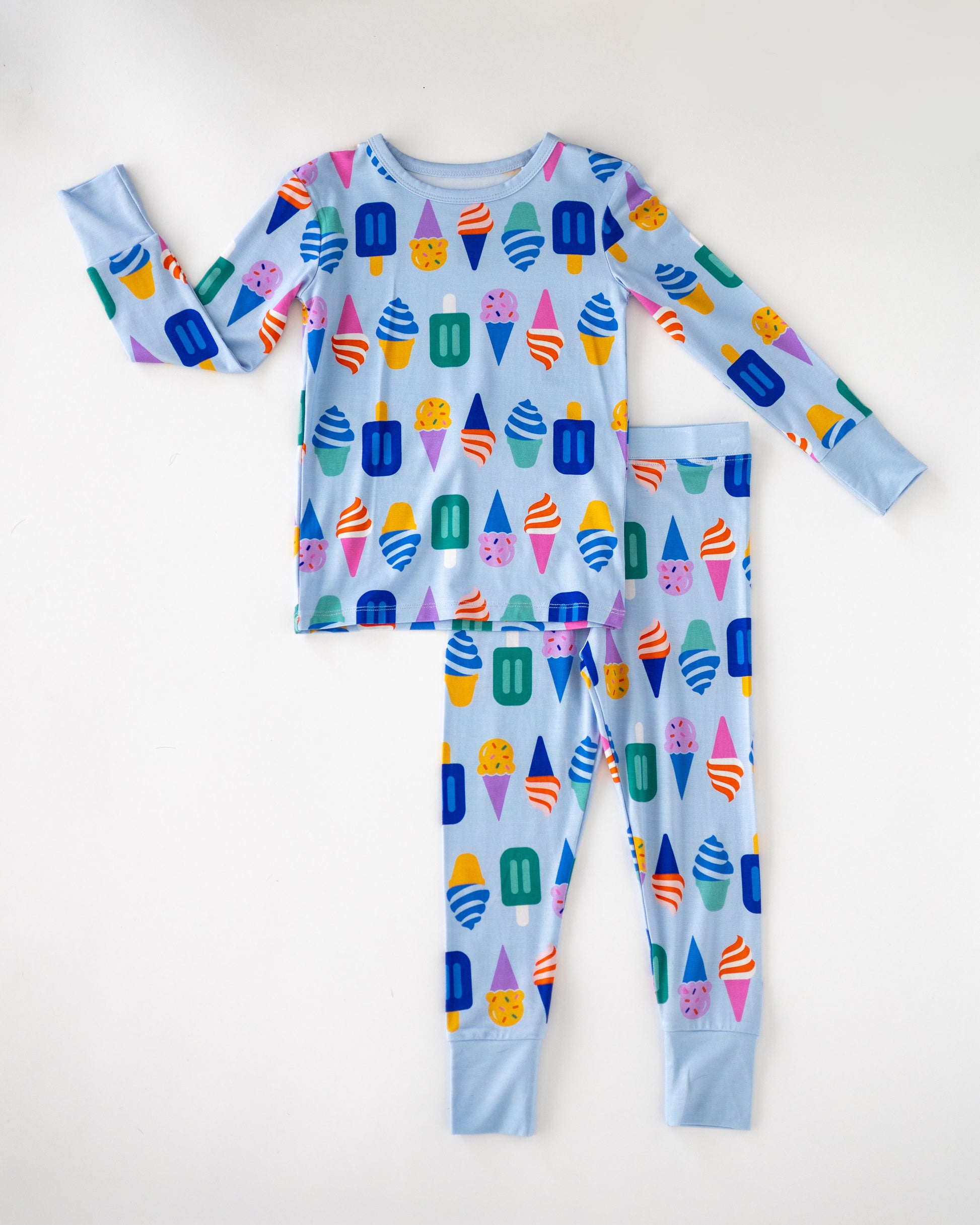 Kids' ice cream patterned pajamas set, blue, soft cotton, long sleeves and pants for comfort.