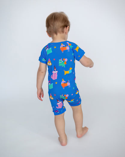 Toddler short-sleeve romper in bright blue with colorful animal prints, perfect for playtime and casual outings.